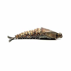 Silver Gilt Articulated Fish Pendant with Red Eyes