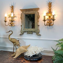 Miroir mural italien en bois sculpté et argenté 18ème siècle