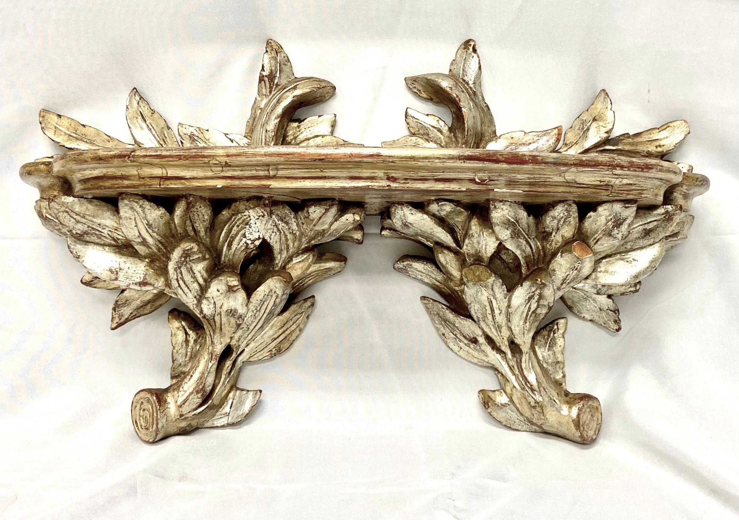 Beautiful antique silver gilt hand carved wood wall shelf. Perfect for displaying art work or décor.