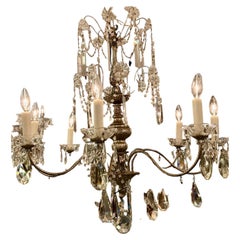 Silver gilt chandelier with crystal and eight lights