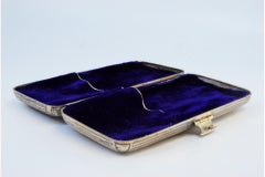 Silver-gilt cigar case with hunting scene, monogram panel and velvet interior