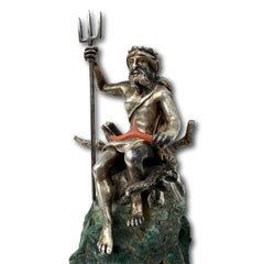 Silver gilt figure of Neptune upon a malachite boulder. Italian, 19th century.