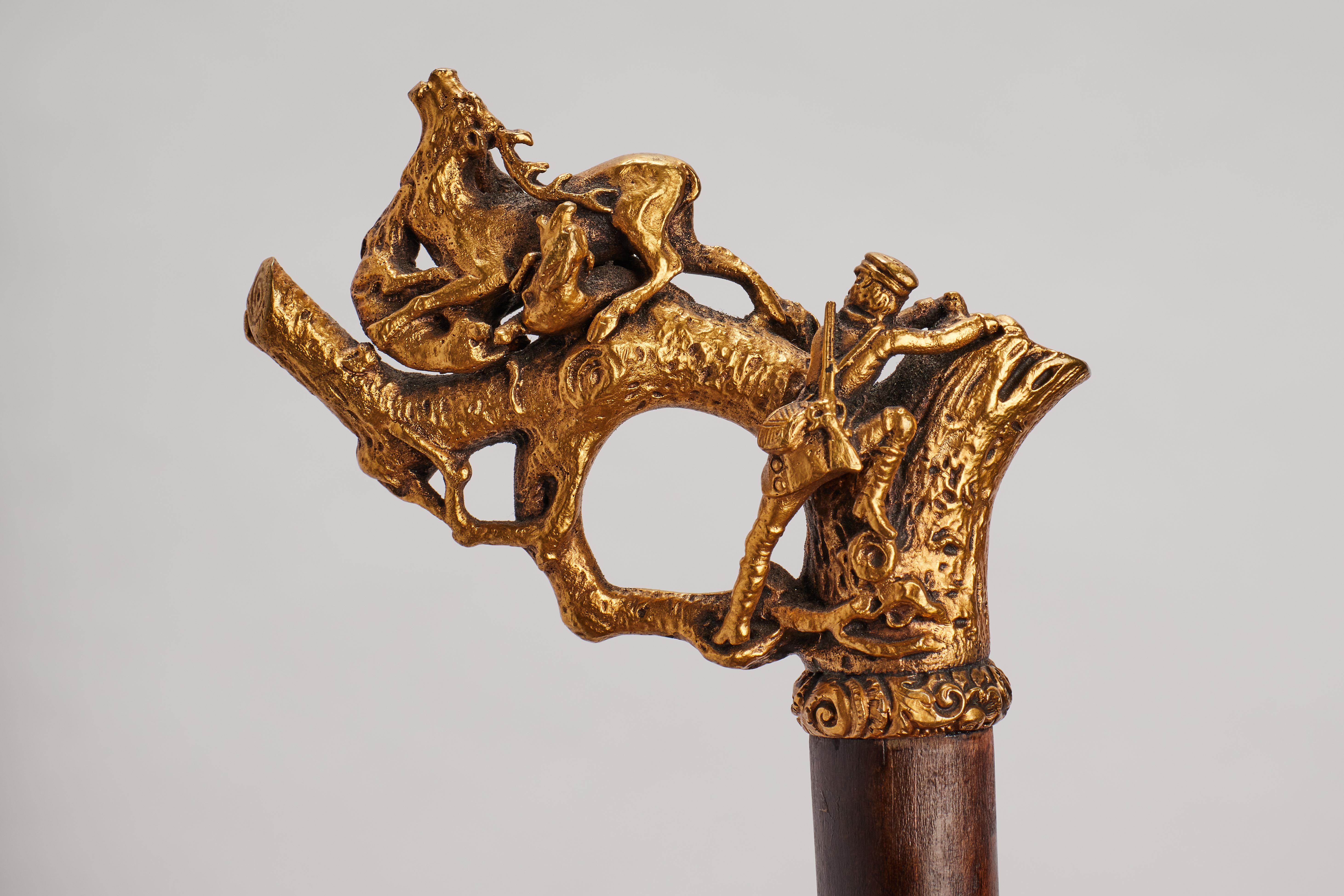 19th Century Silver gilt handle walking stick depicting an hunting scene, Germany 1890.  For Sale