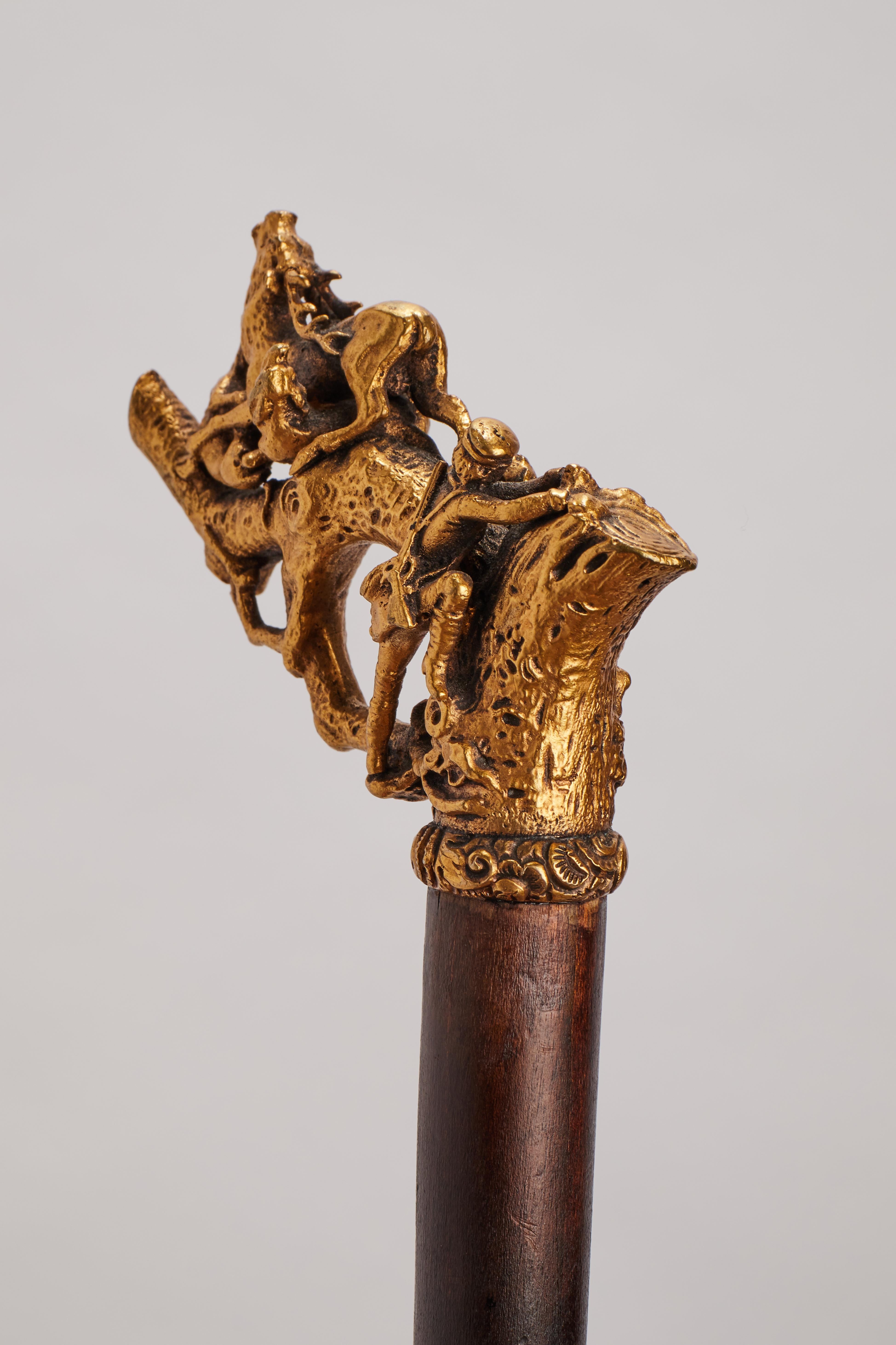 Metal Silver gilt handle walking stick depicting an hunting scene, Germany 1890.  For Sale
