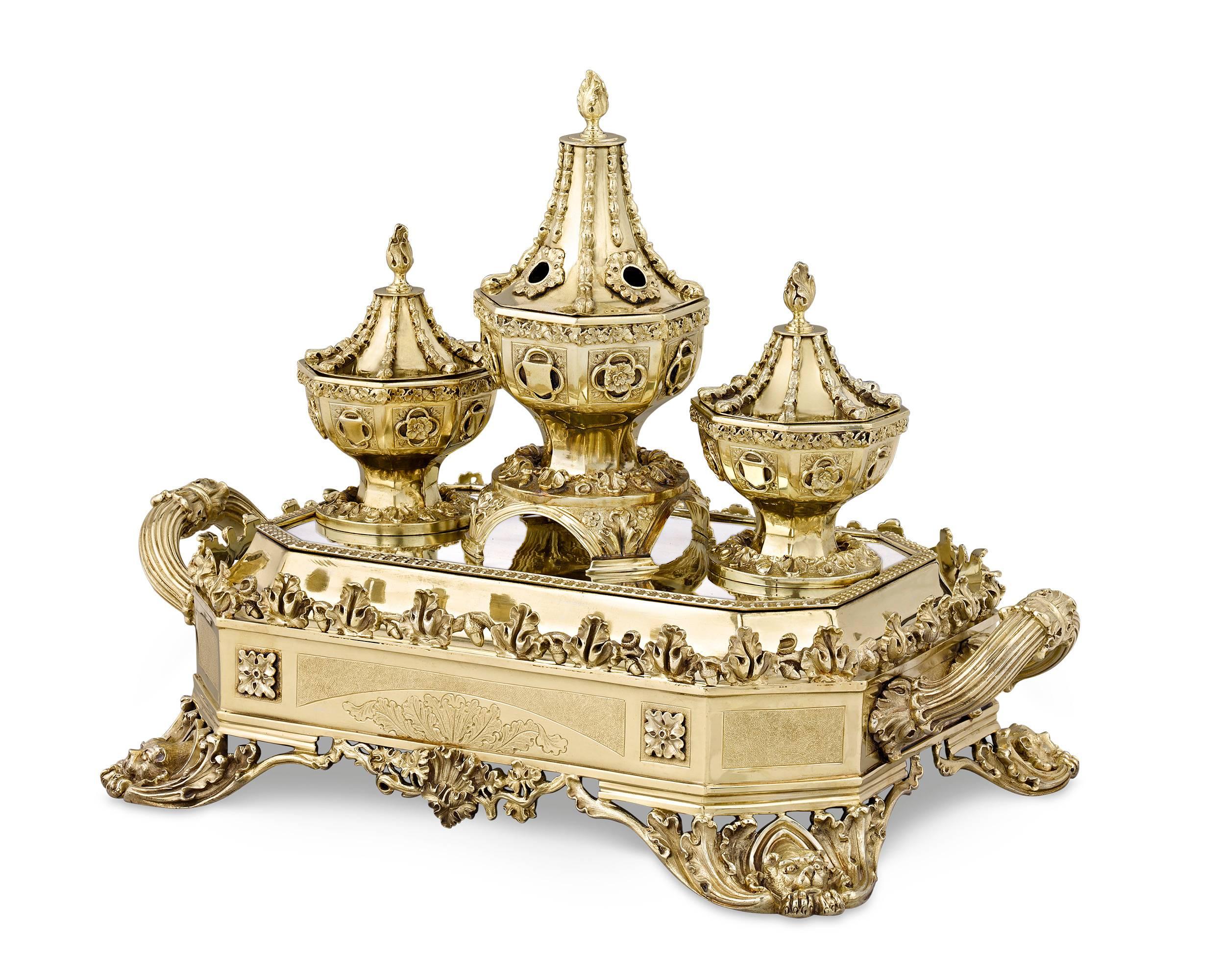 The unbridled boldness of William IV-period silver design is on full display in this grand silver gilt inkstand by William Bateman II. Hailing from one of the most legendary silversmithing families in England, William dutifully continues in the
