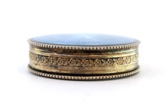 Silver-gilt pill box with enamel florals, fleur-de-lis and gold interior