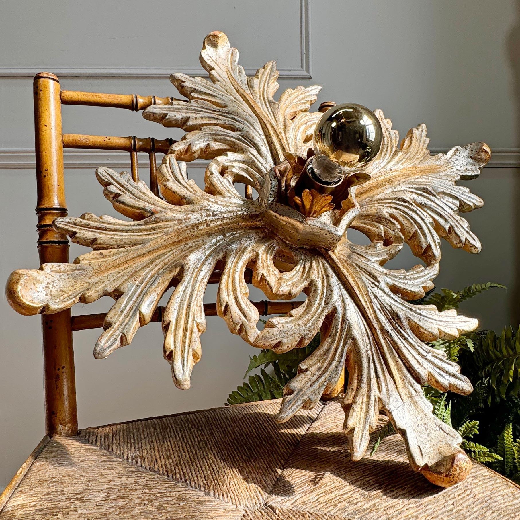 Superb hand carved wooden Florentine flush mount light, finished in silver gilt with gold flourishes, could be used either as a ceiling or wall light.

It takes one large screw in bulb e27.



60cm Width/Height
15cm Depth