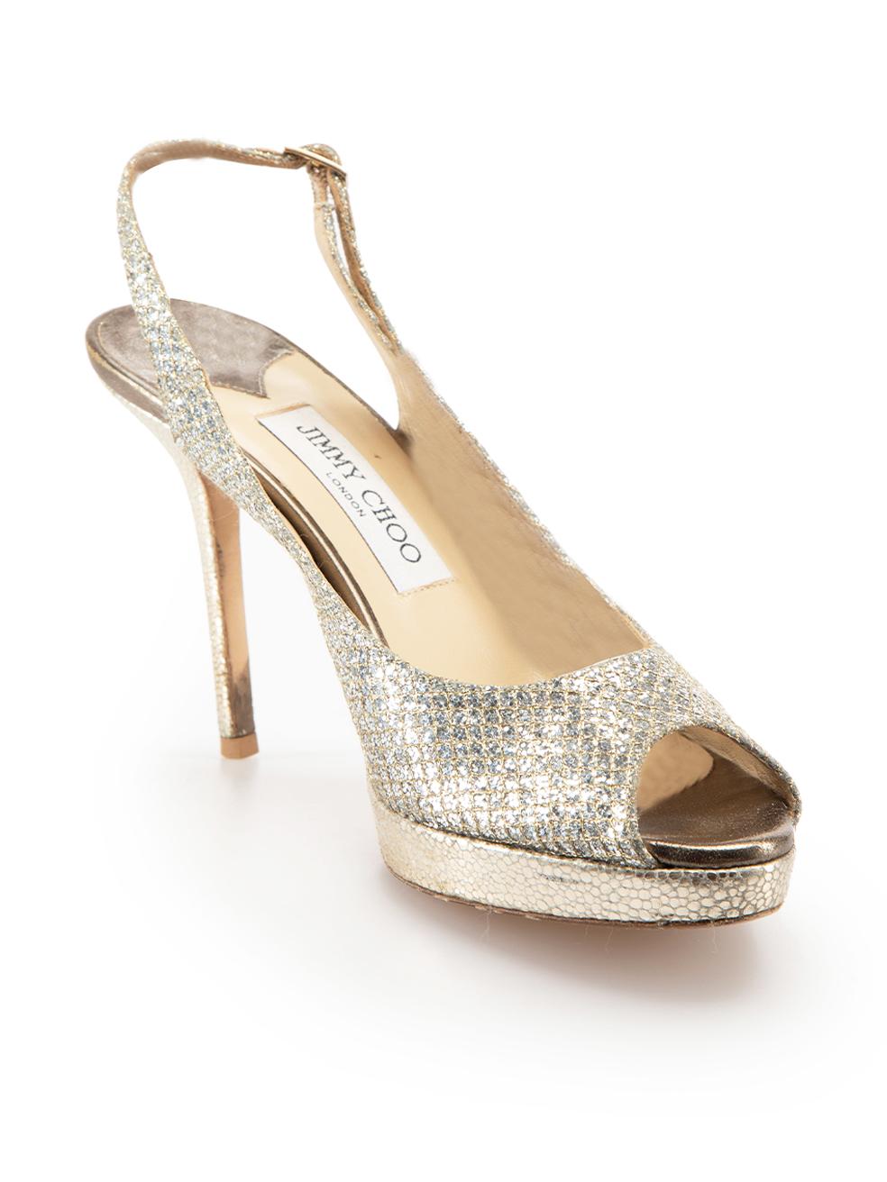 CONDITION is Very good. Minimal wear to shoes is evident. Minimal wear to the right shoe heel-stem with scuff marks and wear to both slingback straps on this used Jimmy Choo designer resale item. These shoes come with original box and dust