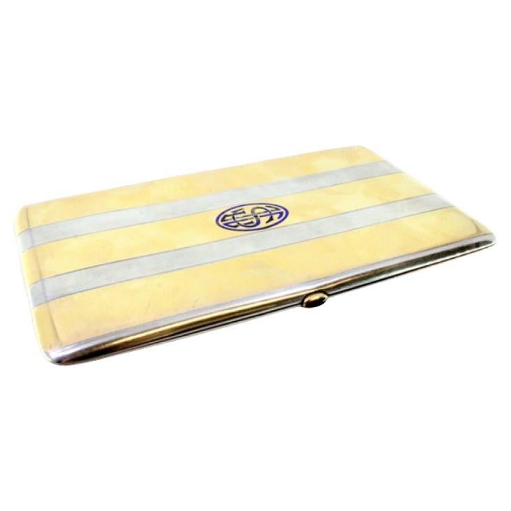 Silver-gold case with top bands, monogram, gold interior and cabochon clasp For Sale