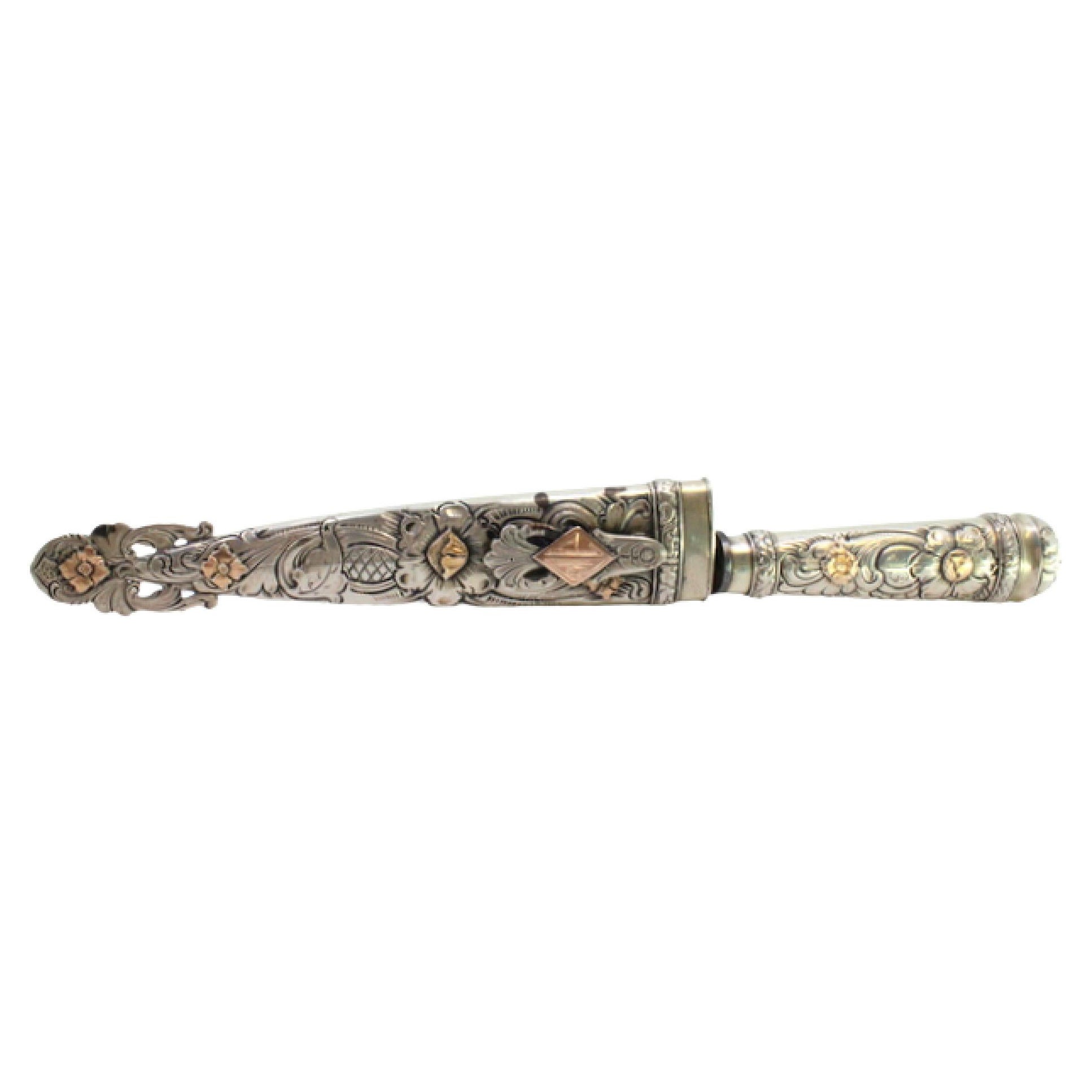 Silver-gold dagger w/ cutouts, floral motifs 
Asian-style reliefs, steel blade For Sale