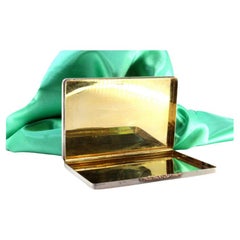 Silver-gold perforated case with gold interior and gilt clasp