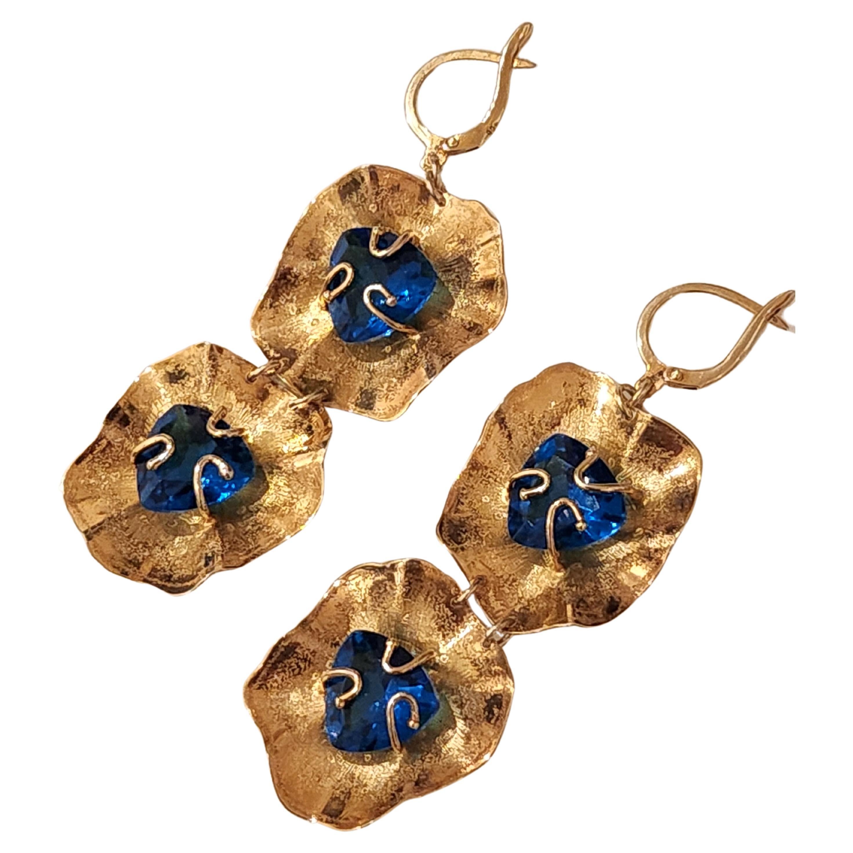 Silver 925 large hand made earrings in dangling scrubed gold plated style decorted with blue stones with total silver weight of 18 grams in fine workmanship
