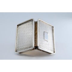 Silver-gold vinaigrette box with corded lid trim, George IV period