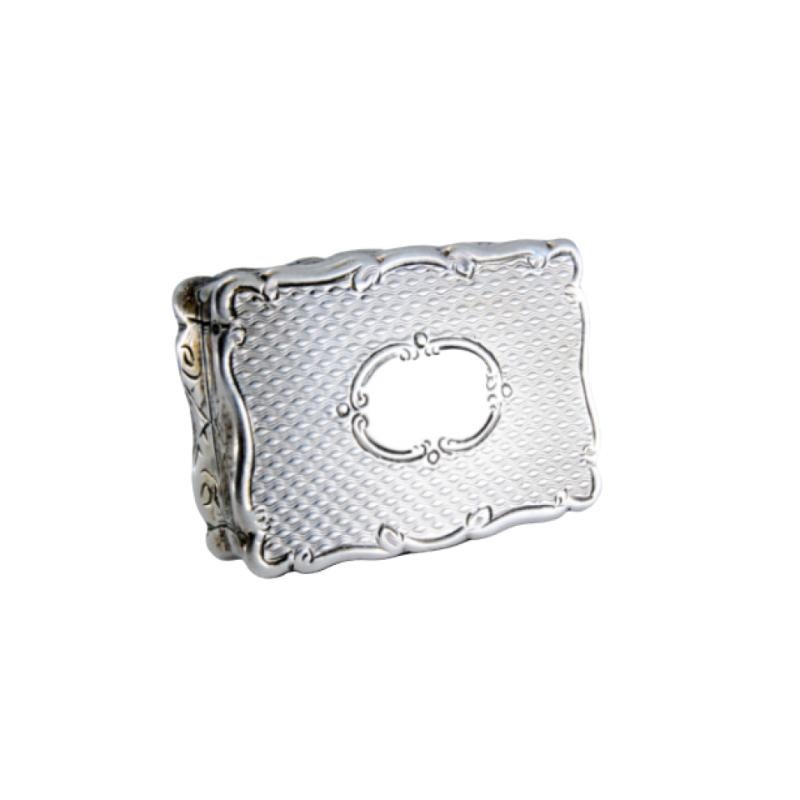 Silver-gold vinaigrette box with corded lid trim, George IV period