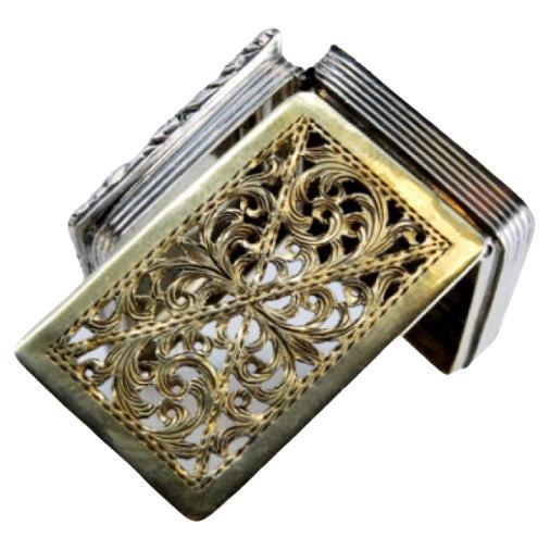 Silver-gold vinaigrette box with friezes and perforated lid, William IV period For Sale