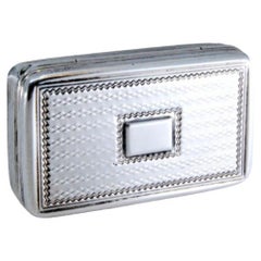 Silver-gold vinaigrette box with friezes and raised lid, George IV period