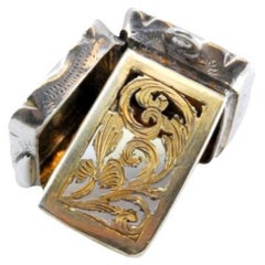 Silver-gold vinaigrette box with geometric lid engraving, Victorian period