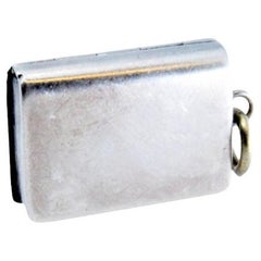 Silver-gold vinaigrette box with smooth book-shaped lid, George III period