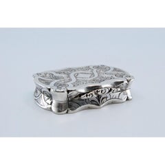 Silver-gold vinaigrette with asymmetrical engraving, Edward VII era