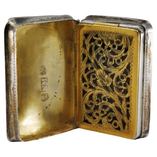 Silver-gold vinaigrette with engraved lid
friezes, George IV period