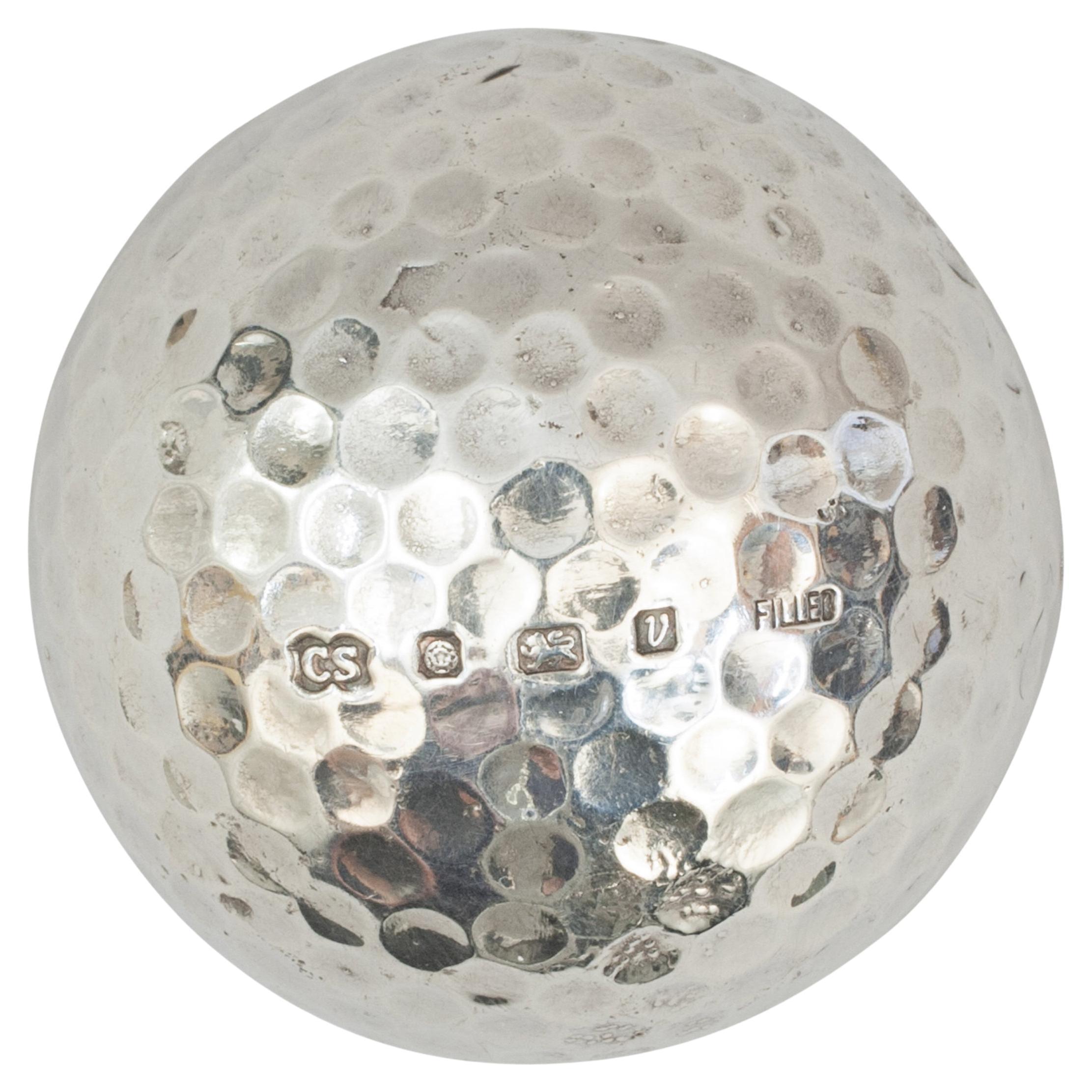 Silberner Golfball