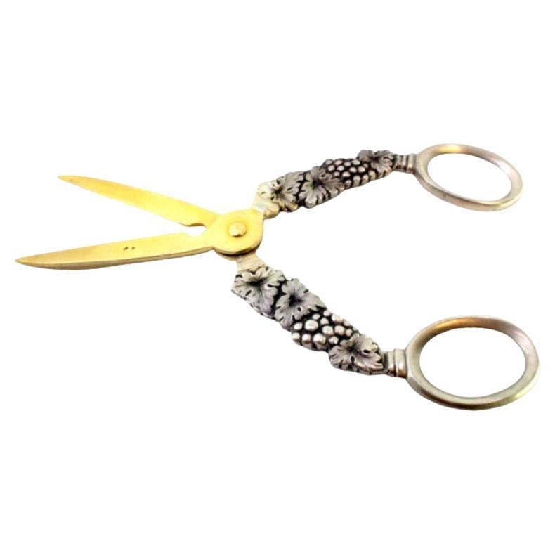 Silver grape scissors with raised bunches and golden ends For Sale