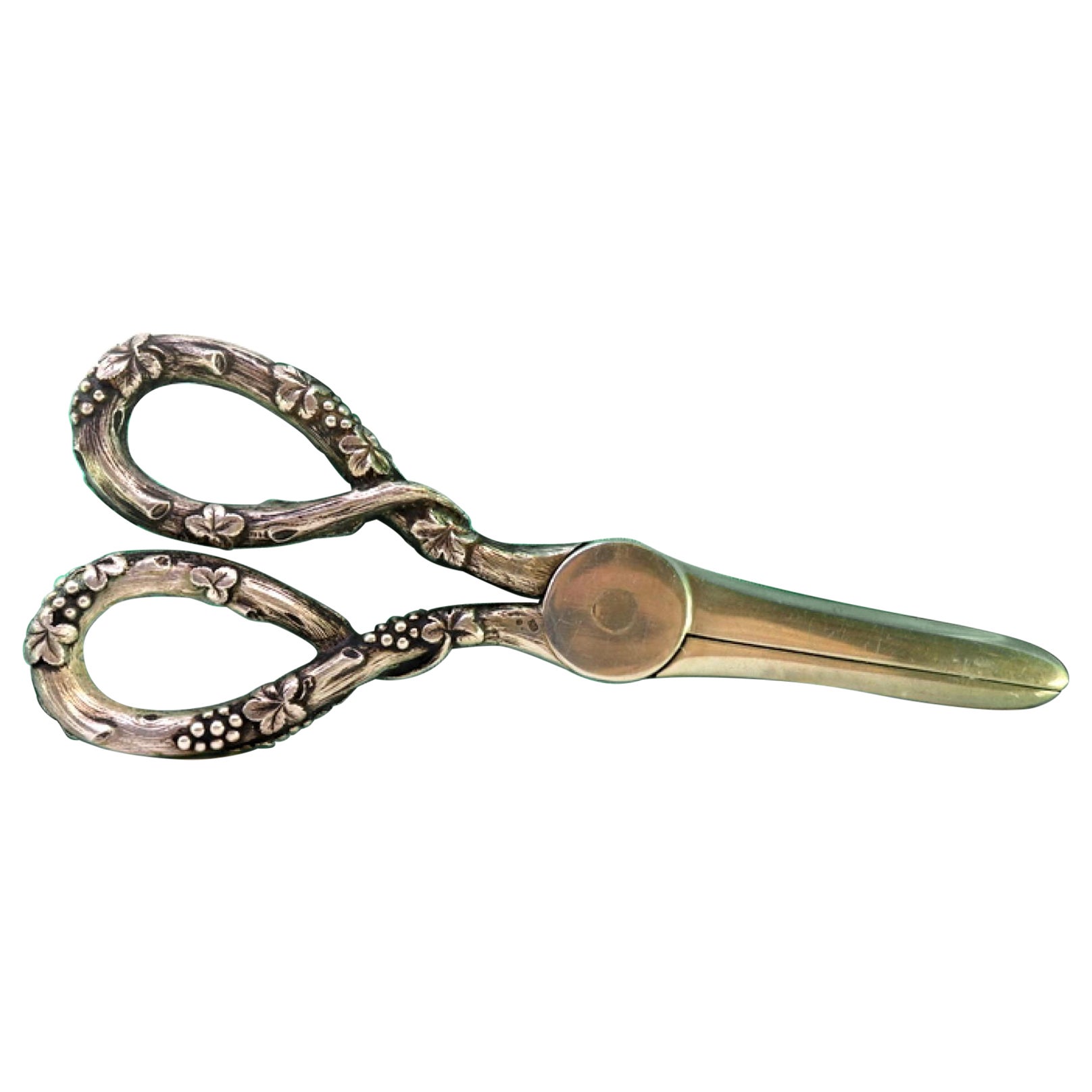 Silver grape scissors with reliefs of bunches and vines on the handle in vendita