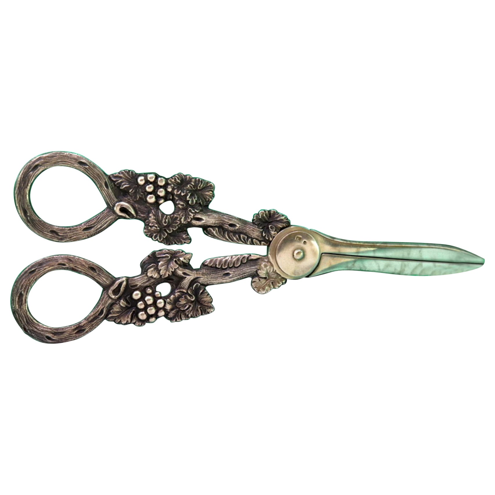 Silver grape scissors with vine and bunch reliefs on the handle