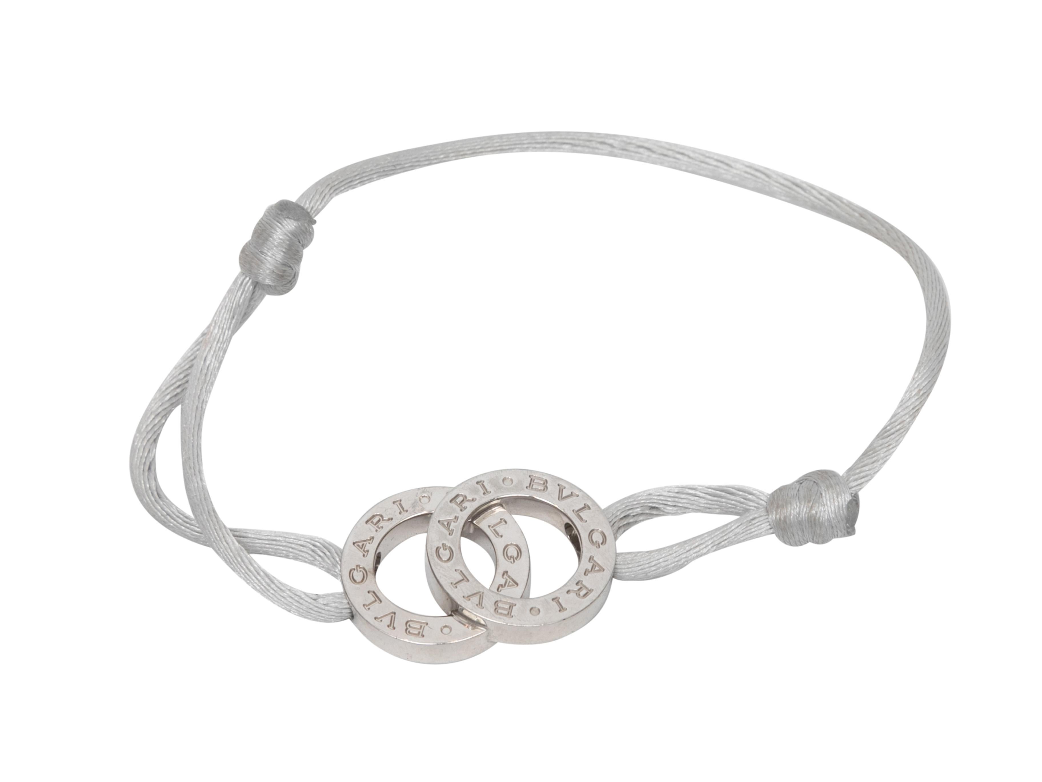  Silver and grey satin bracelet by Bvlgari. 0.1
