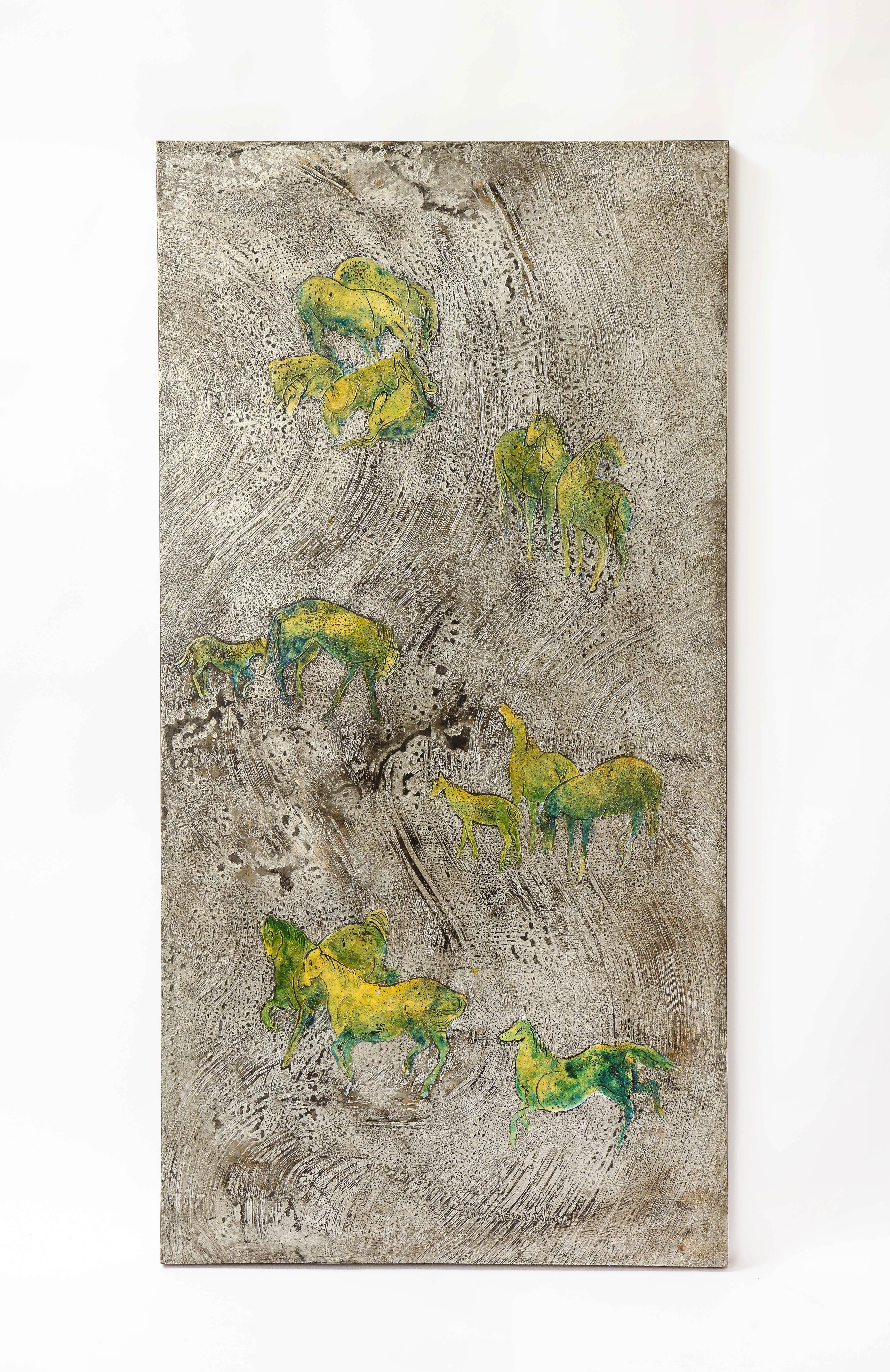 A fantastic and quite rare acid etched metal panel of green iridescent horses on a silver ground, Signed Philip and Kelvin LaVerne. This is one of the rarer signed LaVerne pieces, due to its size, unusual design, and beautiful vibrant colorway.