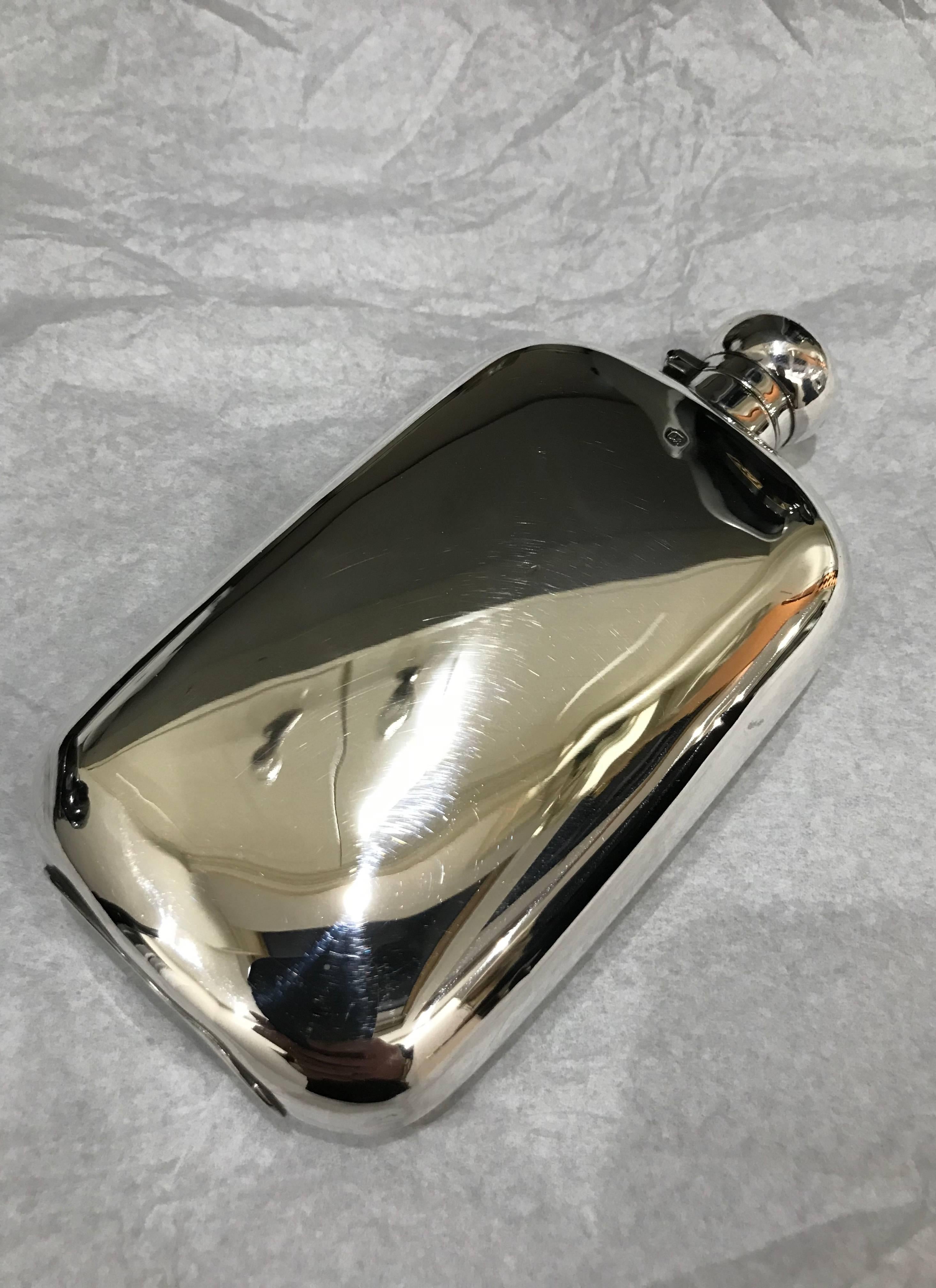 Silver hall marked hip or pocket flask, James Dixon & Sons, 1896

A lovely piece the flask has a curved shape with no sharp corners, making it ideal to keep in the hip pocket, the lid is hinged with a screw grip.

The flask is in very good