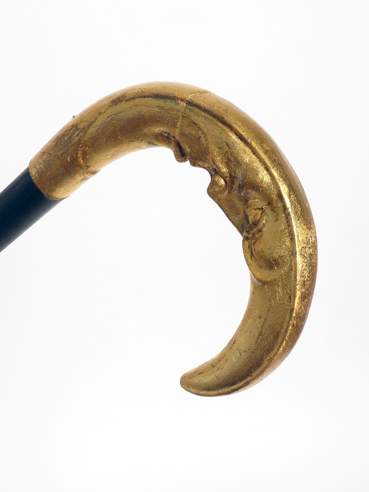 20th Century Silver handle walking stick depicting a crescent moon, France 1900. For Sale