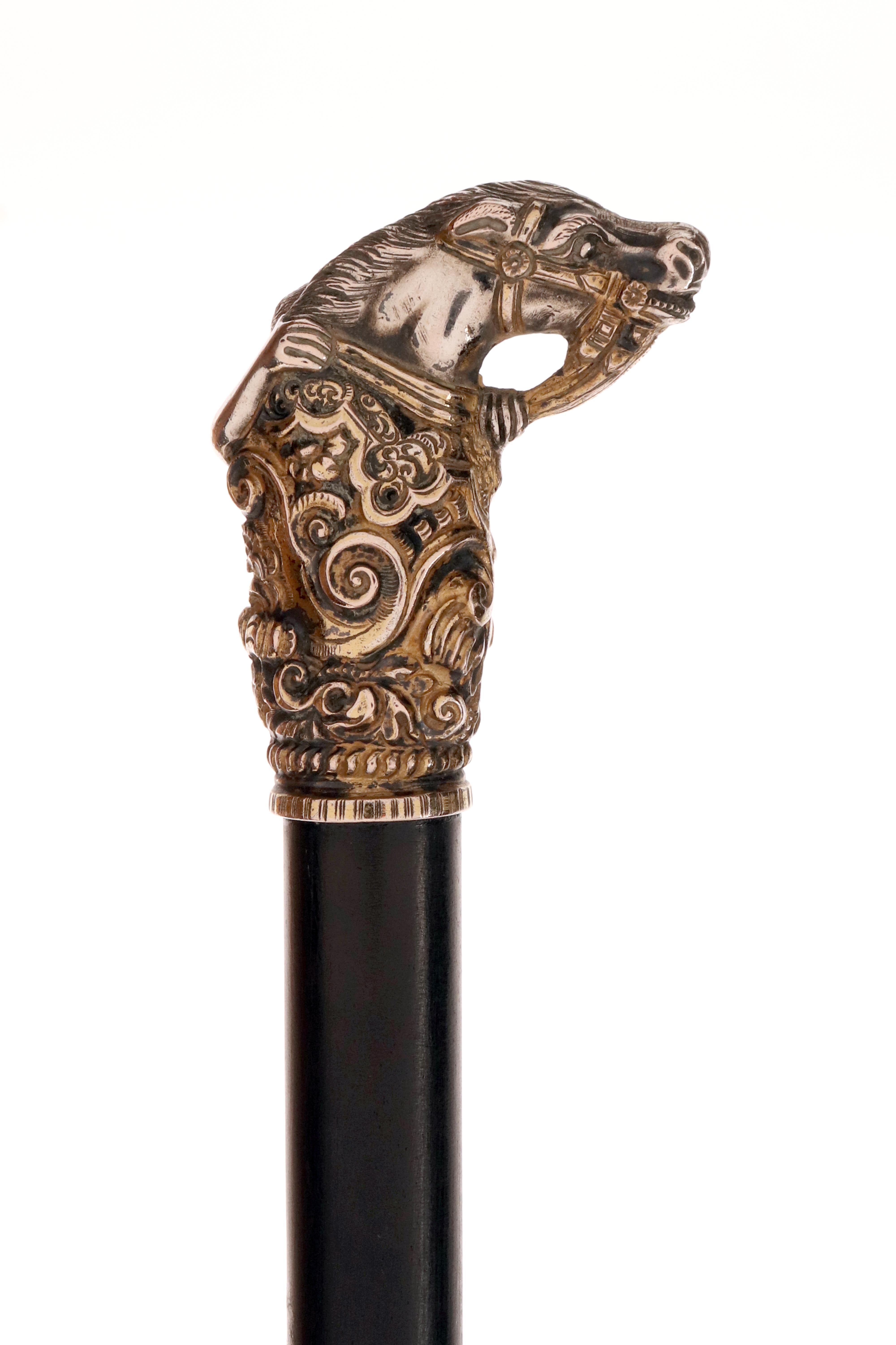 20th Century Silver handle walking stick, depicting a horse head and a jockey, England 1900. For Sale