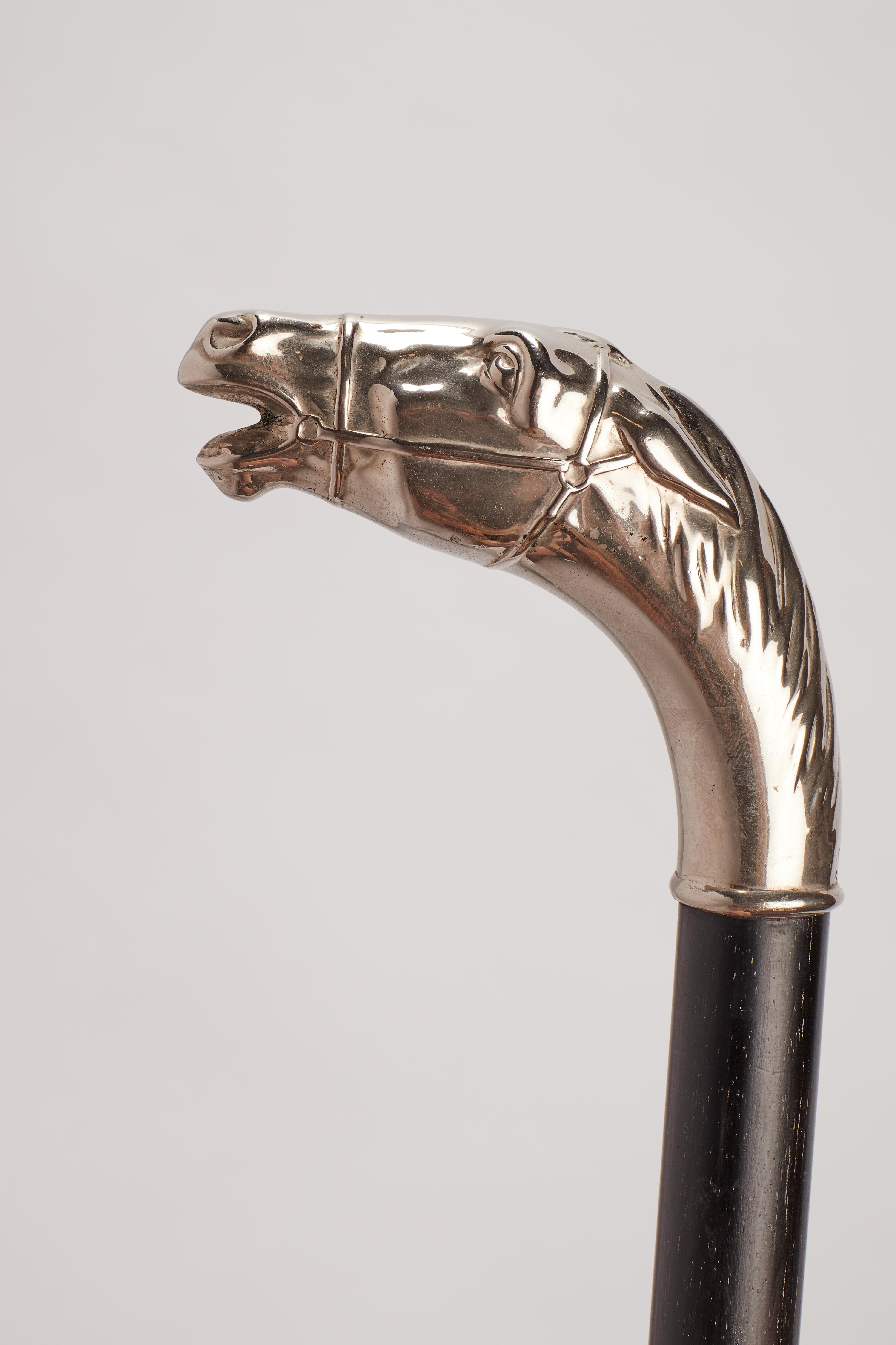 Metallo Silver handle walking stick, depicting the head of a horse Germany 1900. in vendita
