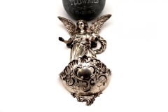 Silver hanging holy water font with reliefs