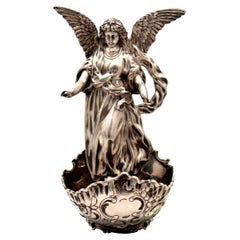 Silver hanging holy water font with reliefs Silver hanging holy water font with reliefs