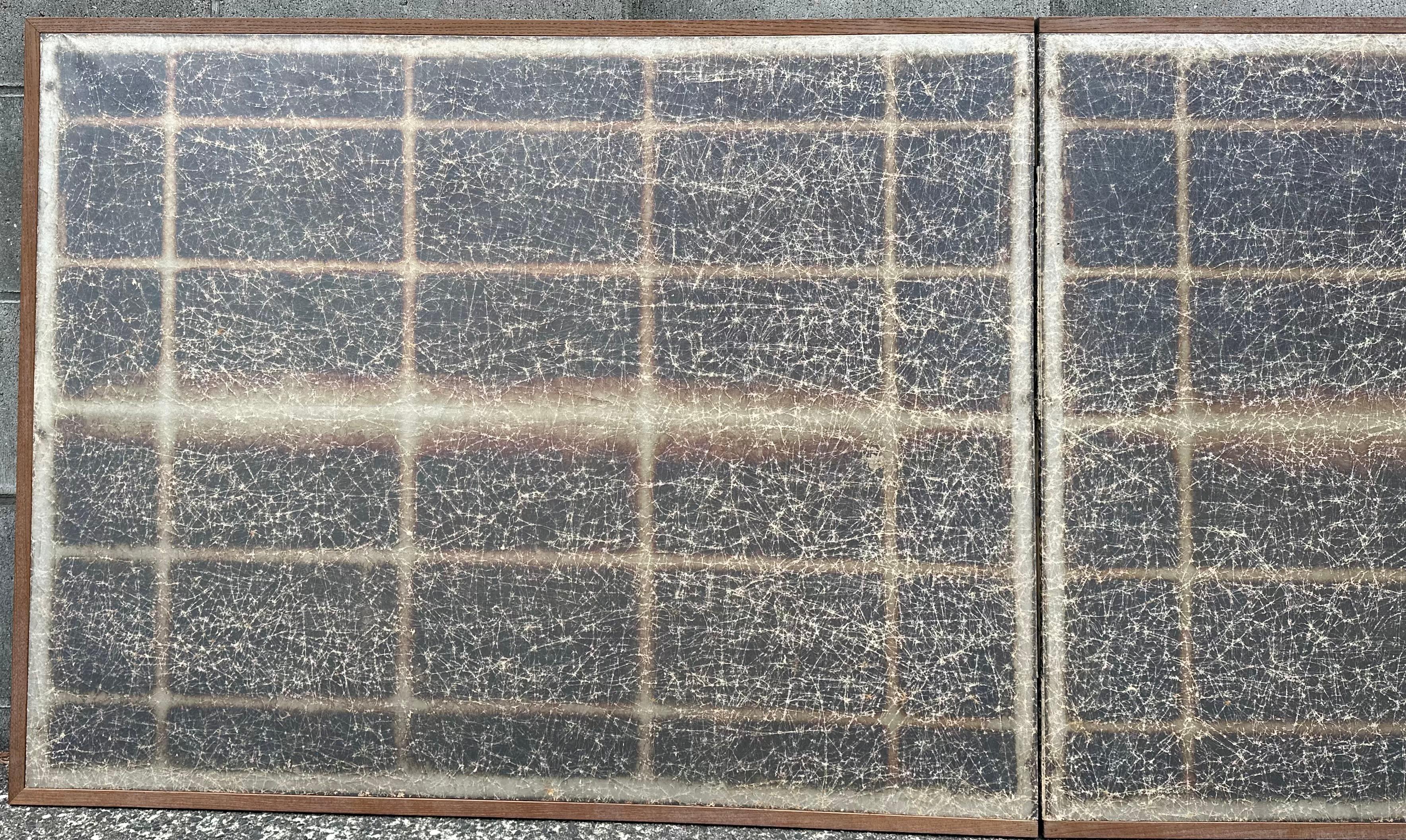 The screen features a minimalist grid-like pattern with a soft silver shimmer, evoking quiet balance and timeless sophistication. Its understated design makes it a versatile piece, seamlessly fitting into both modern and classic interiors, where