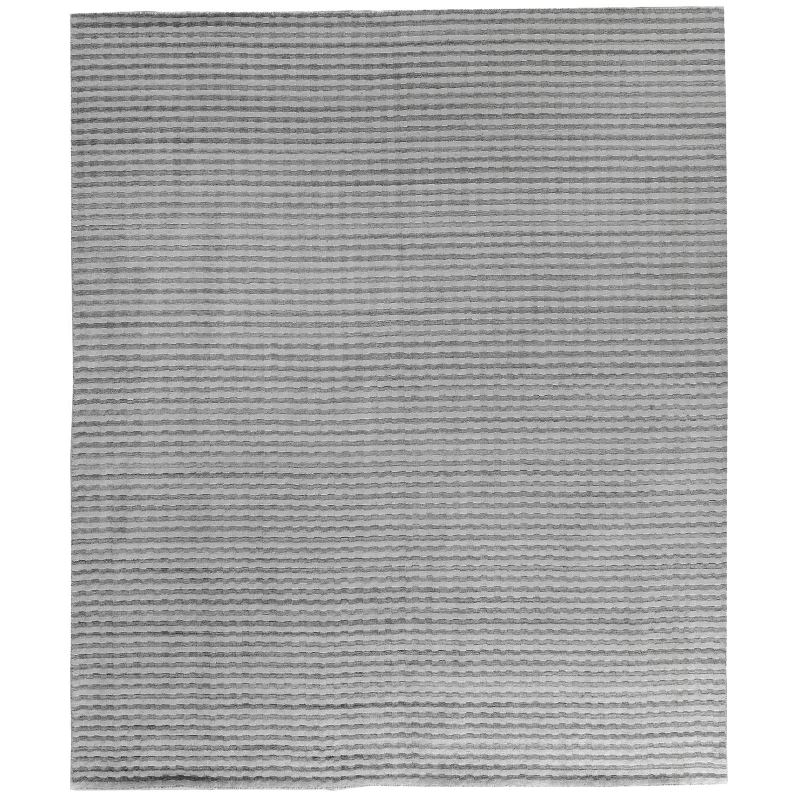 Tapis contemporain argenté de taille haute et basse