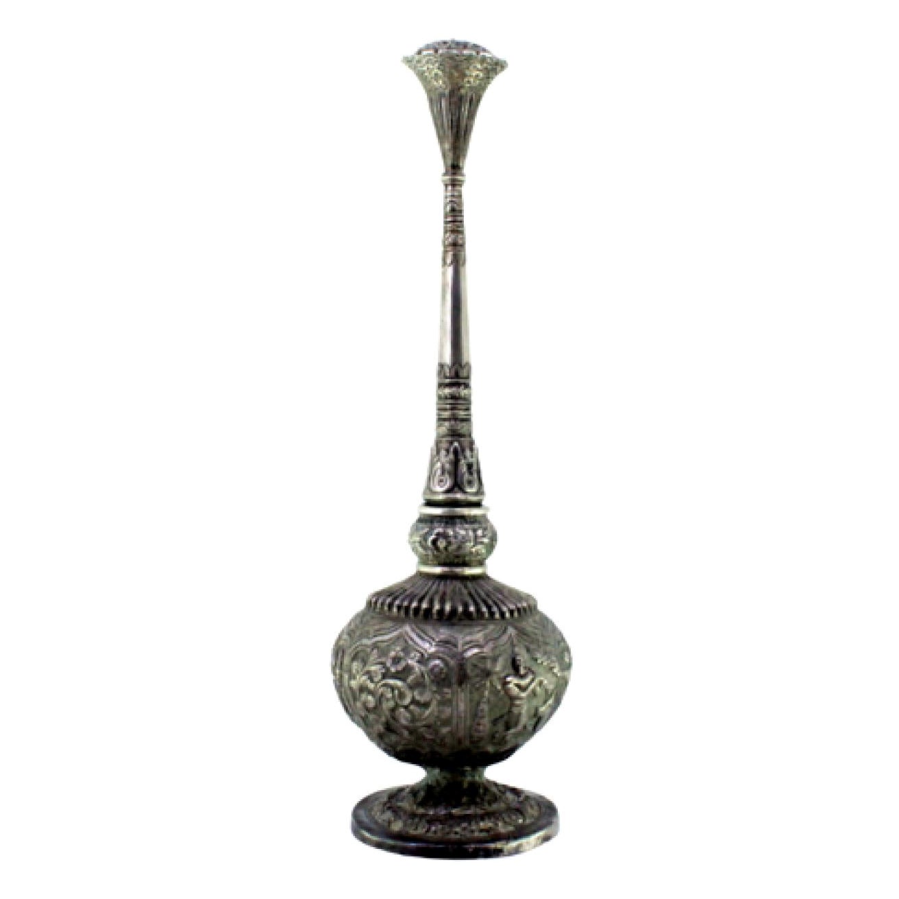 Silver holy water sprinkler w/ Shiva relief 
applications