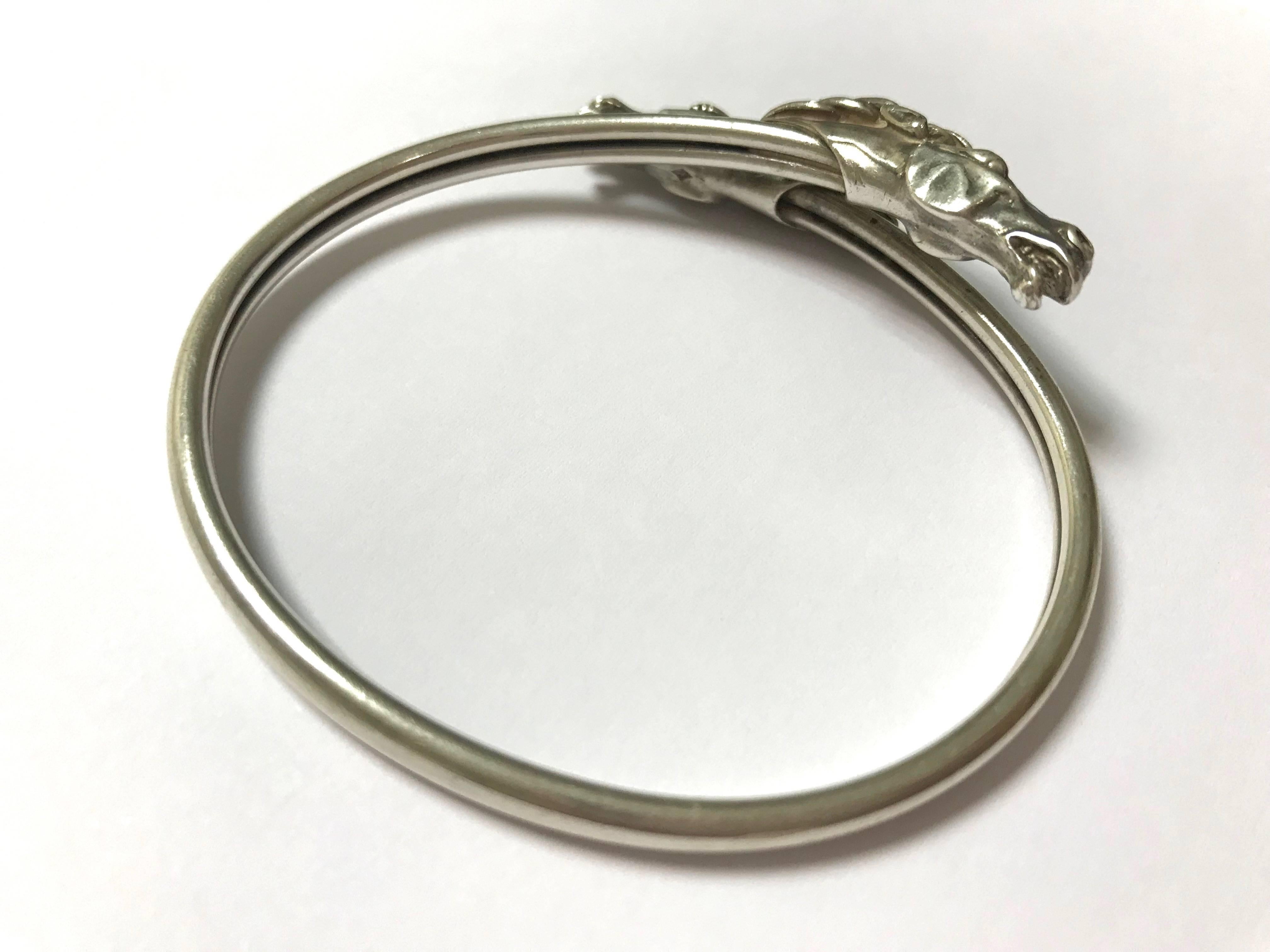 Discover Silver Horse Heads Bangle Bracelet.
Silver 950 23.73 gr
Circa 1970





