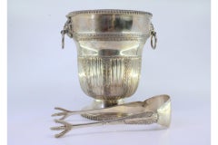 Silver ice bucket & tongs w/ chiseled floral motifs & rim friezes