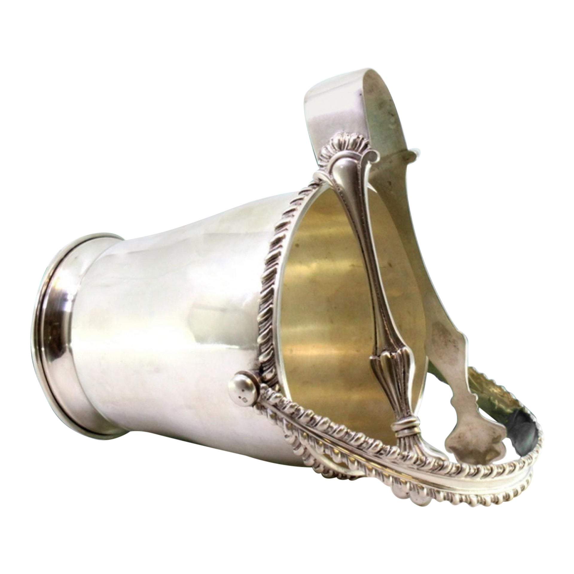 Silver ice bucket with embossed rim, tongs and movable handle