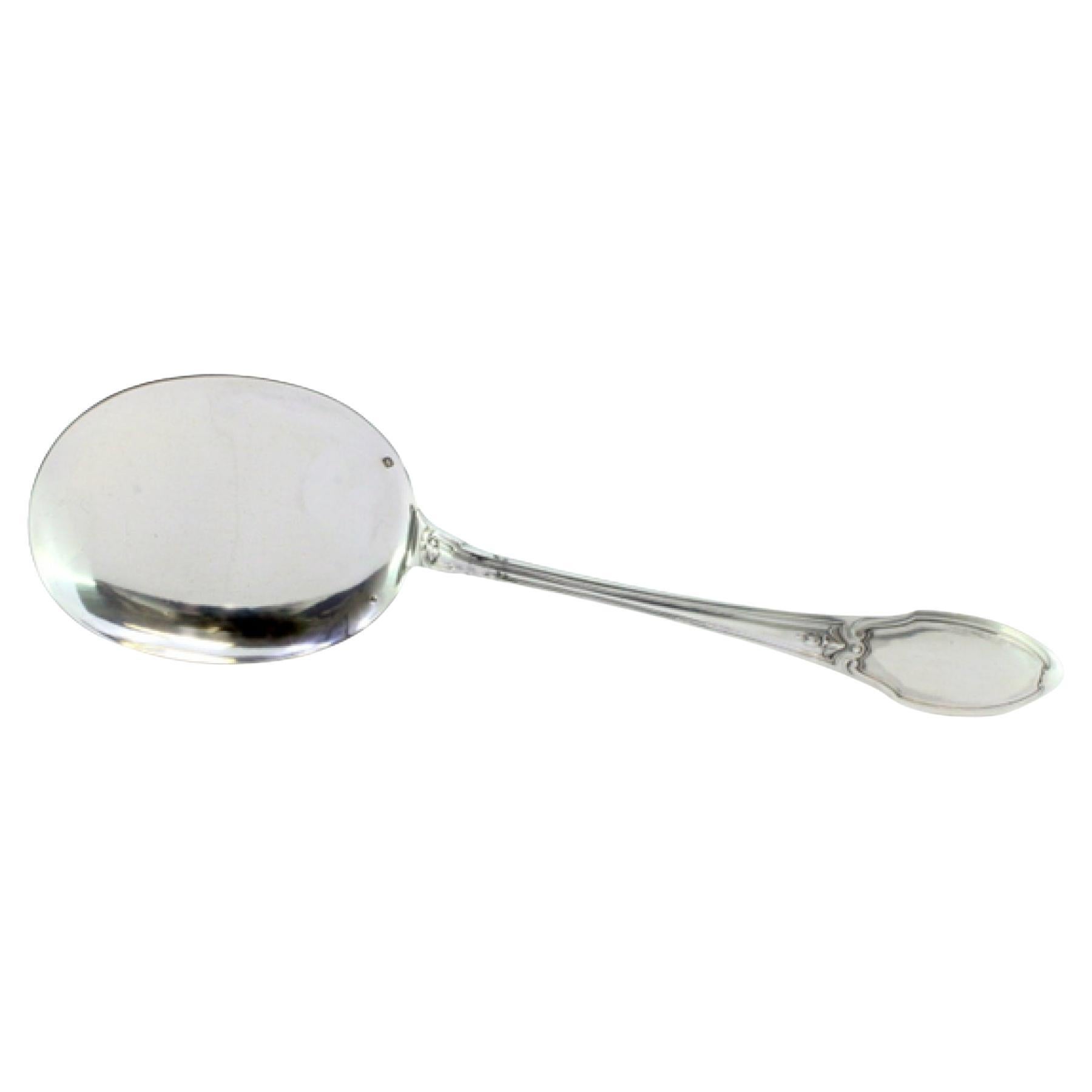 Silver ice cream scoop with smooth shell and crimped reliefs along the handle