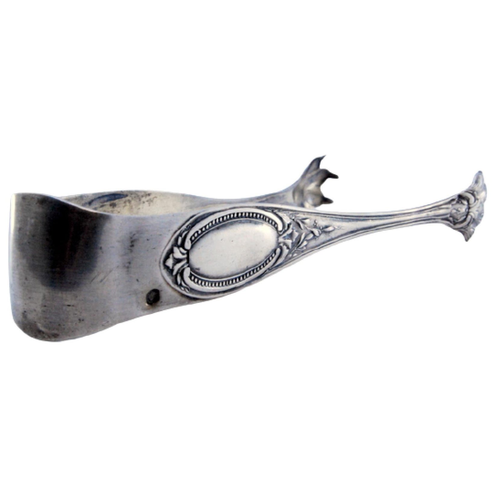 Silver ice tongs in claw shape with monogram card
