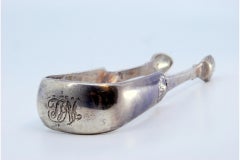 Silver ice tongs in the shape of acanthus leaves