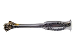 Silver ice tongs in the shape of claws