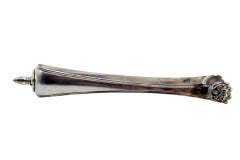 Silver ice tongs in the shape of claws