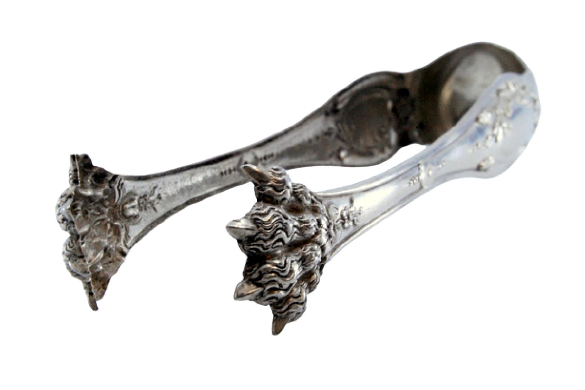 Silver ice tongs in the shape of claws For Sale