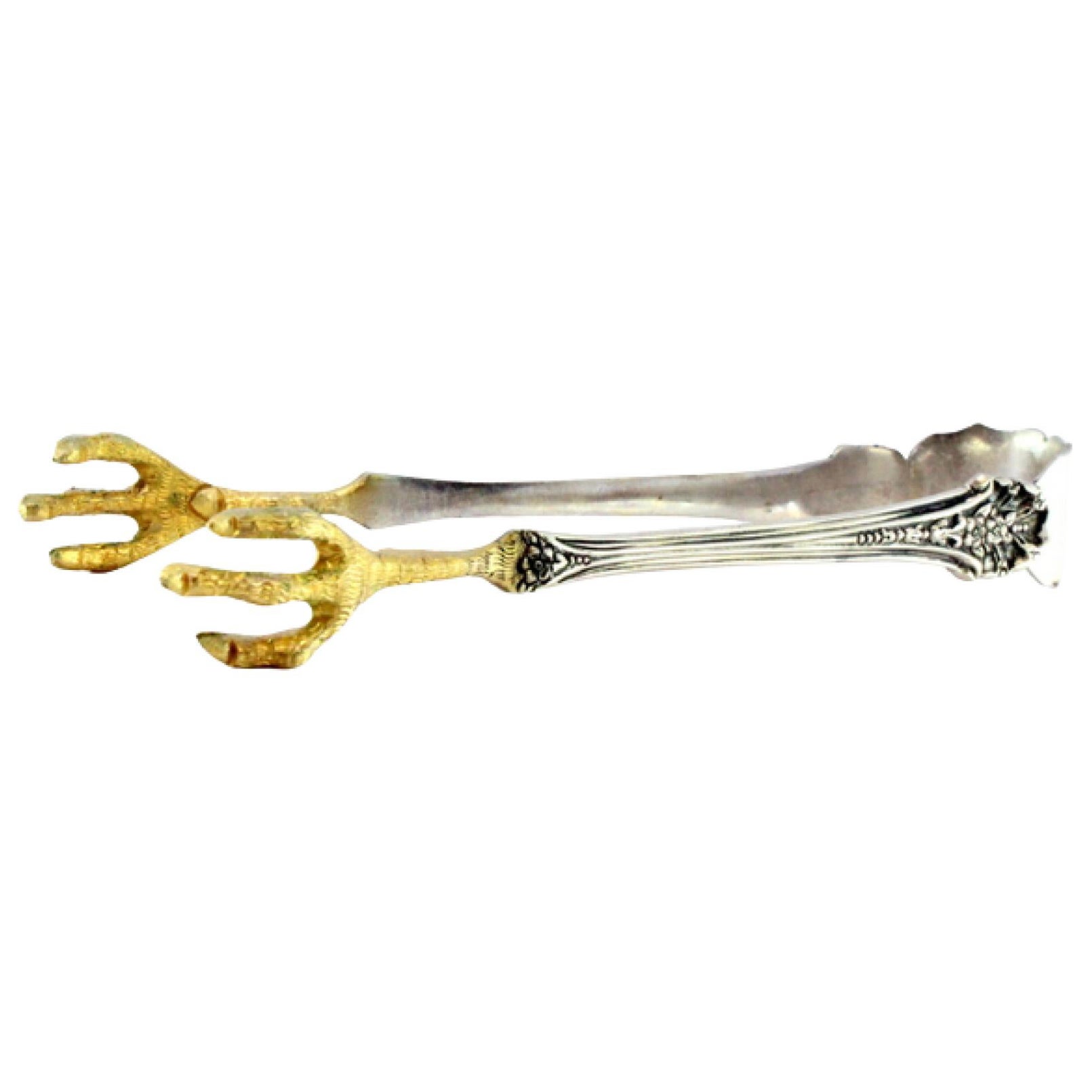 Silver ice tongs in the shape of golden bird claws
