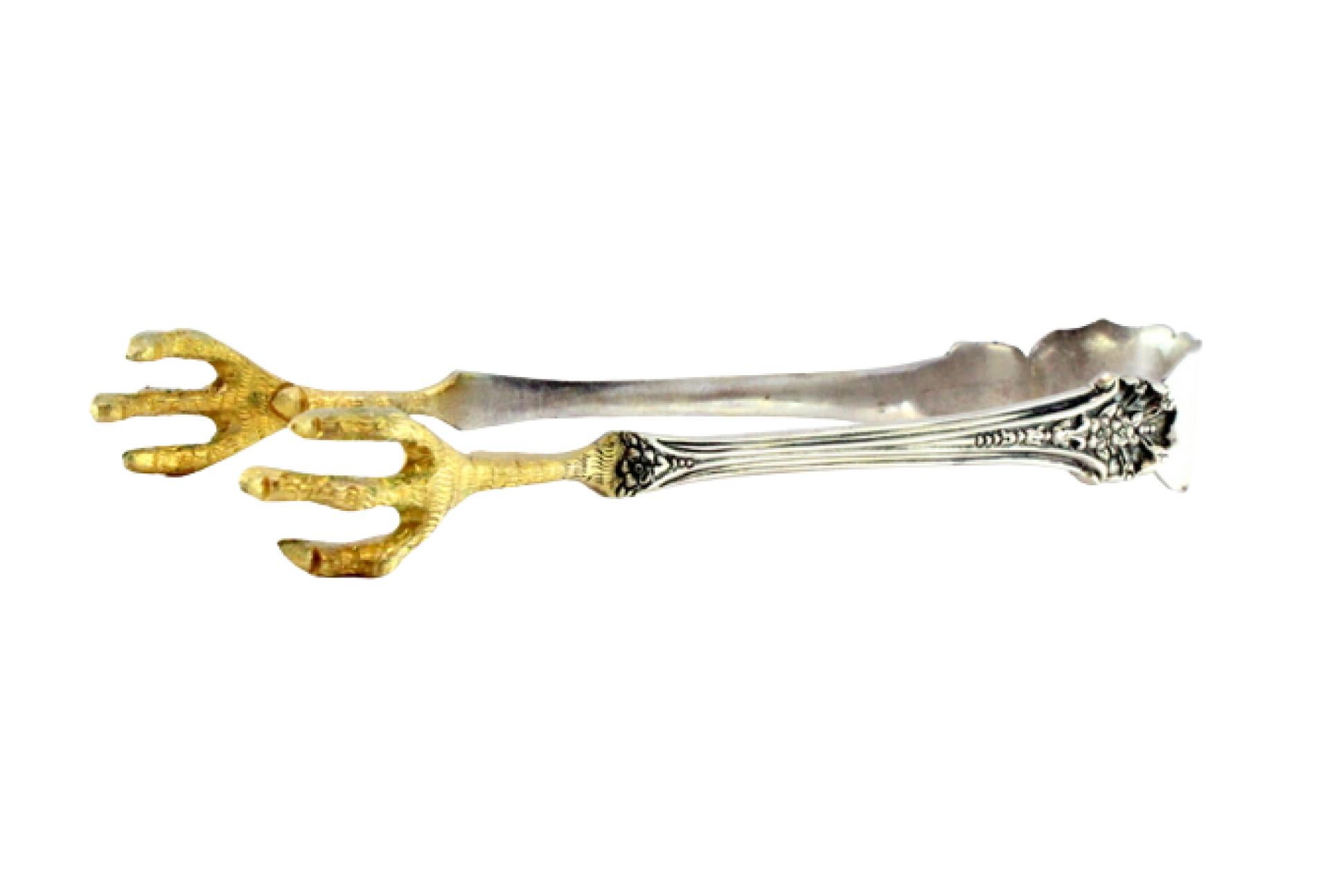 Silver ice tongs in the shape of golden bird claws For Sale